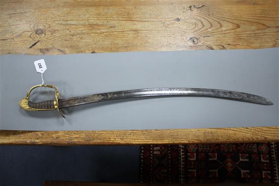 A Georgian infantry officers sword, fine gilt hilt, the curved blade gilt etched with GR and Royal Arms, blade 73.5cm, overall length